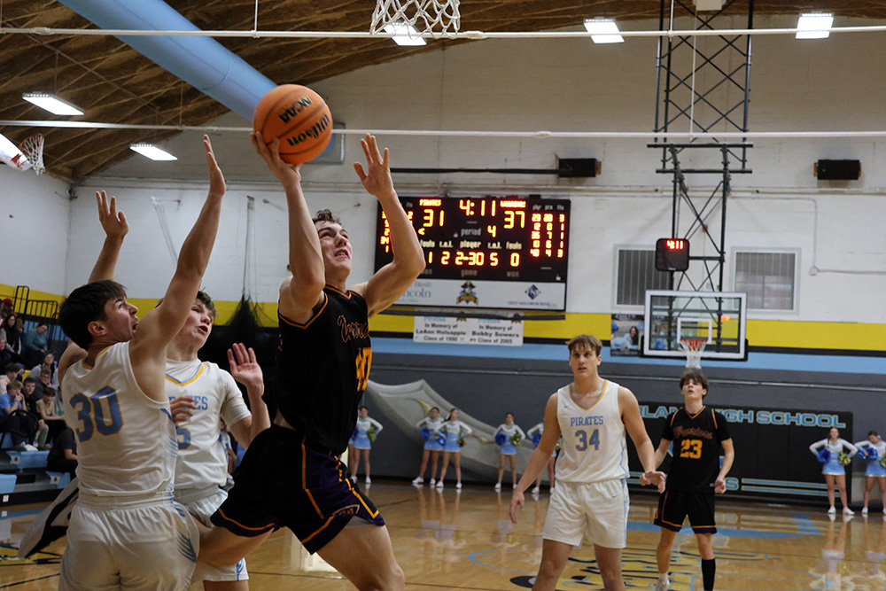 Fred Thomas drives hard to the rim against the Cumberland defense. Thomas finished with seven points and six rebounds in the road victory. —photo by Terri Cox