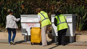 Democrats sue Postal Service over rule on mail-in ballots